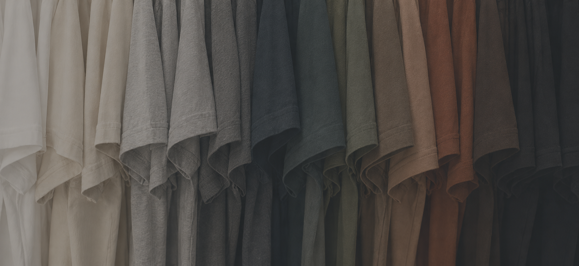 Rack of blank apparel in a range of colors