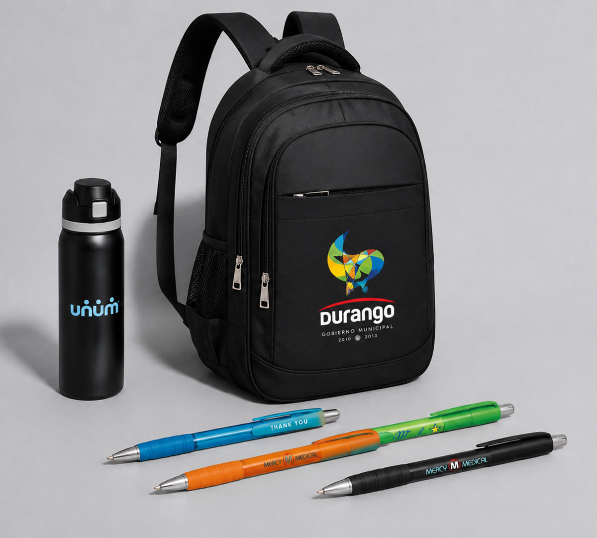 A branded backpack, insulated water bottle and pens shown together as one bundle